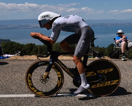 Brent Van Moer rolls along the time trial with Lake Geneva in the background