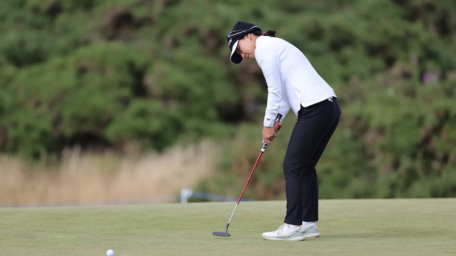 Jenny Shin of South Korea putts during day two of the 2026 ISPS HANDA Women's Scottish Open at Dundonald Links at Ayrshire, Scotland, on Friday, July 24, 2026. (Steve Welsh/PA via AP)(Steve Welsh/Steve Welsh/PA via AP)