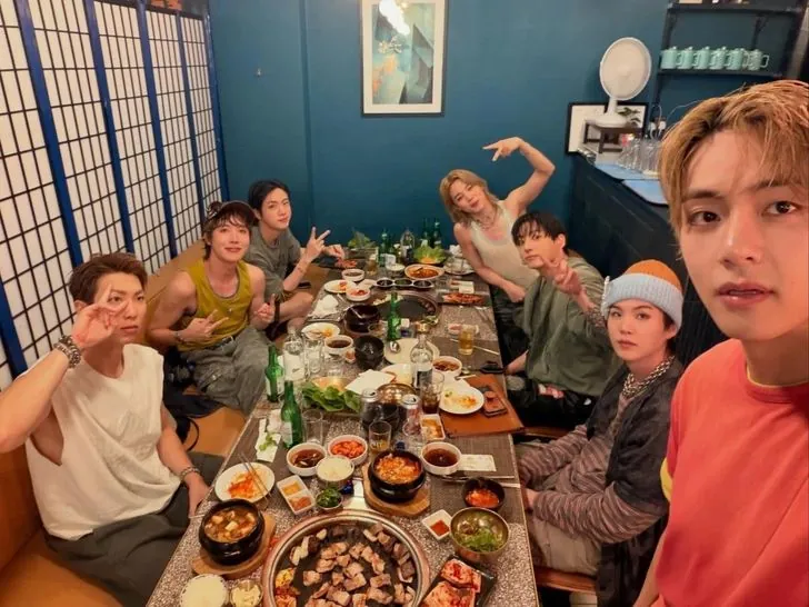BTS members enjoy Korean barbecue, as seen in this image from social media. The K-pop group will perform at the inaugural FIFA World Cup final halftime show at the MetLife Stadium in New Jersey, July 19. / Captured from V's social media